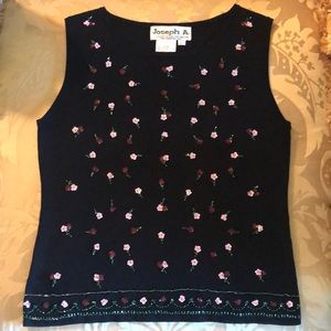 Black shell with red/pink/green beading.